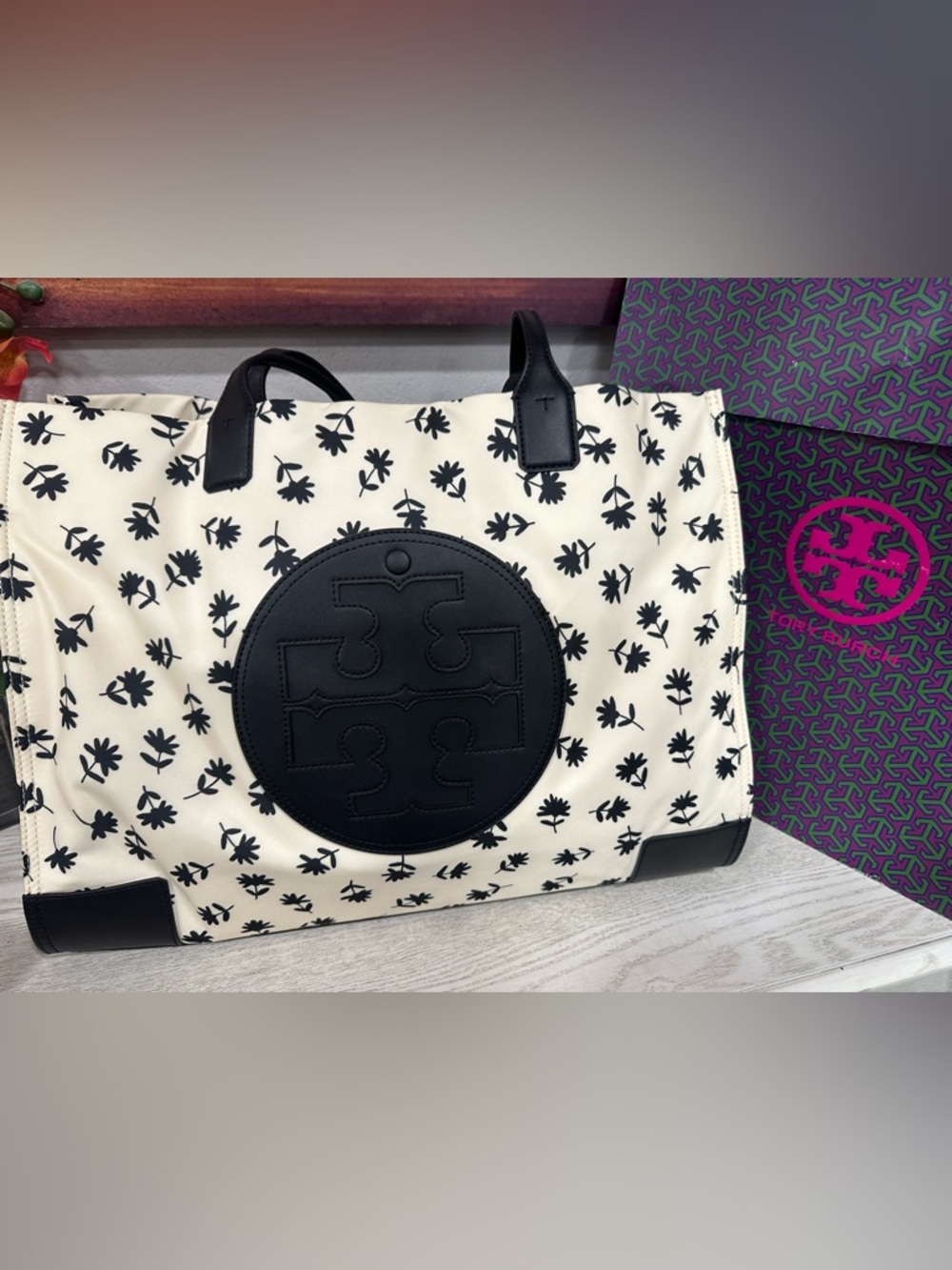 Tory Burch Cream Tote with Black Floral Logo Patch